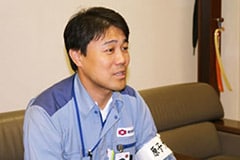 Mr. Sato being interviewed